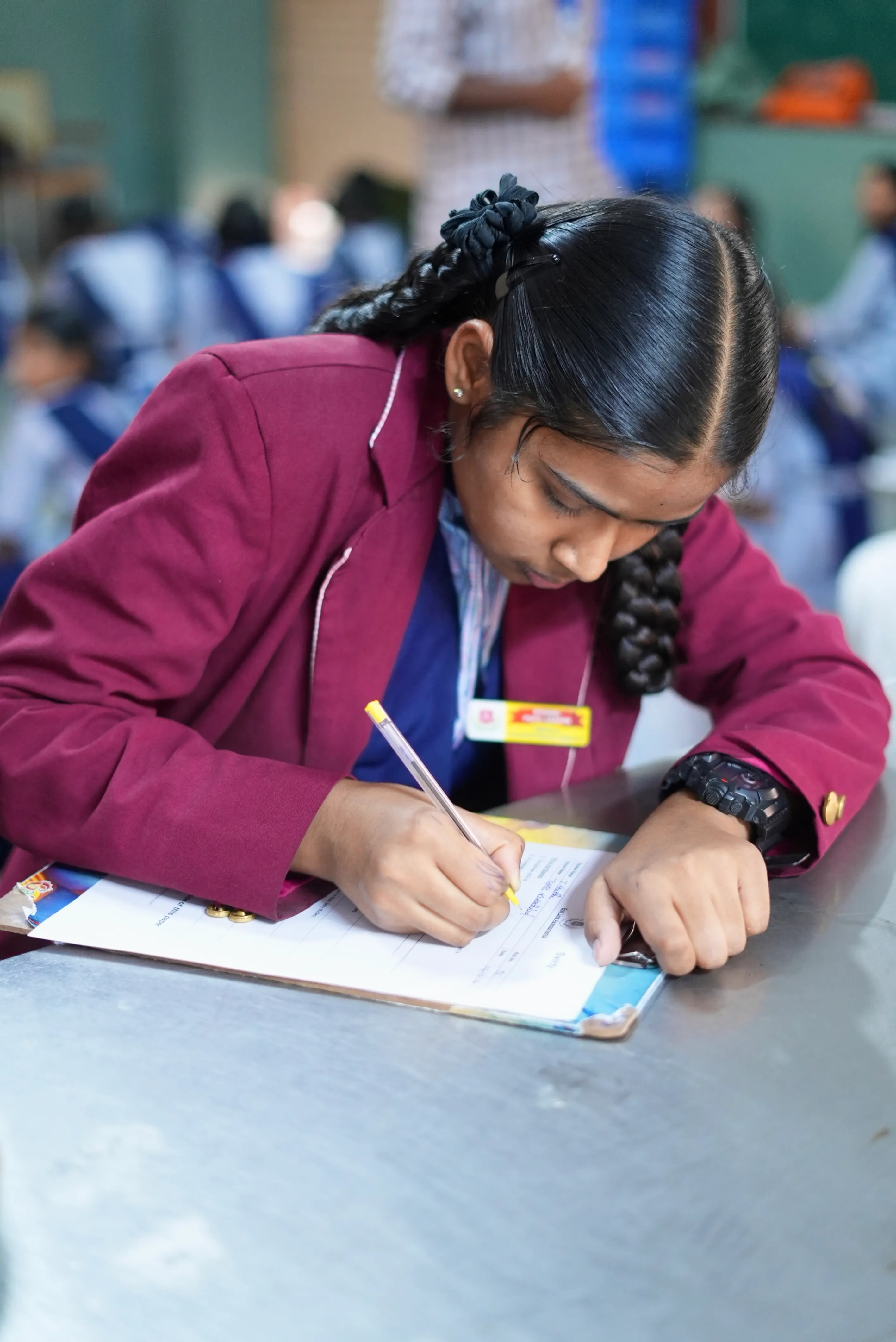 Student writing during the program