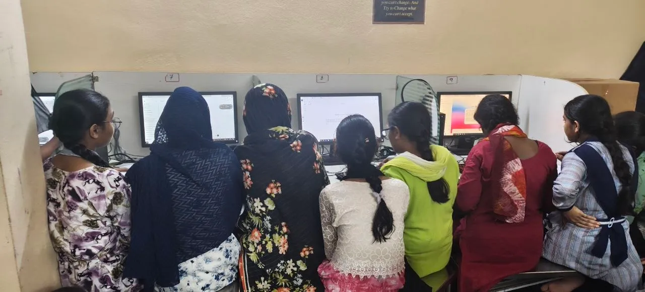 Students using computers during the session