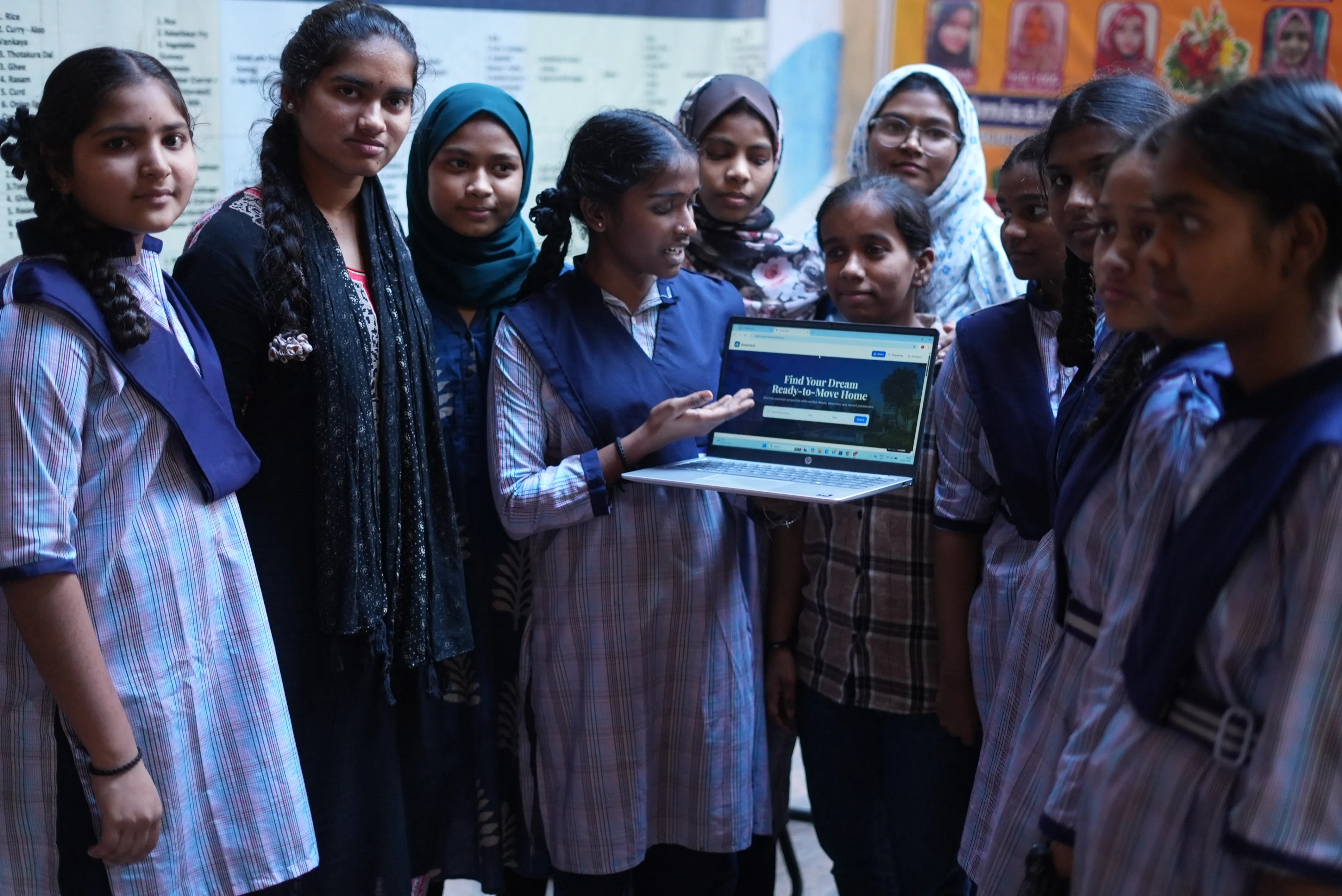 Students working on laptops together